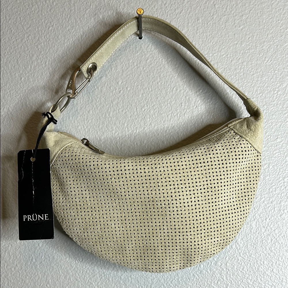 Prüne cream perforated suede shoulder bag